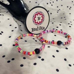 Boho polymer clay beads bracelet with black stone.